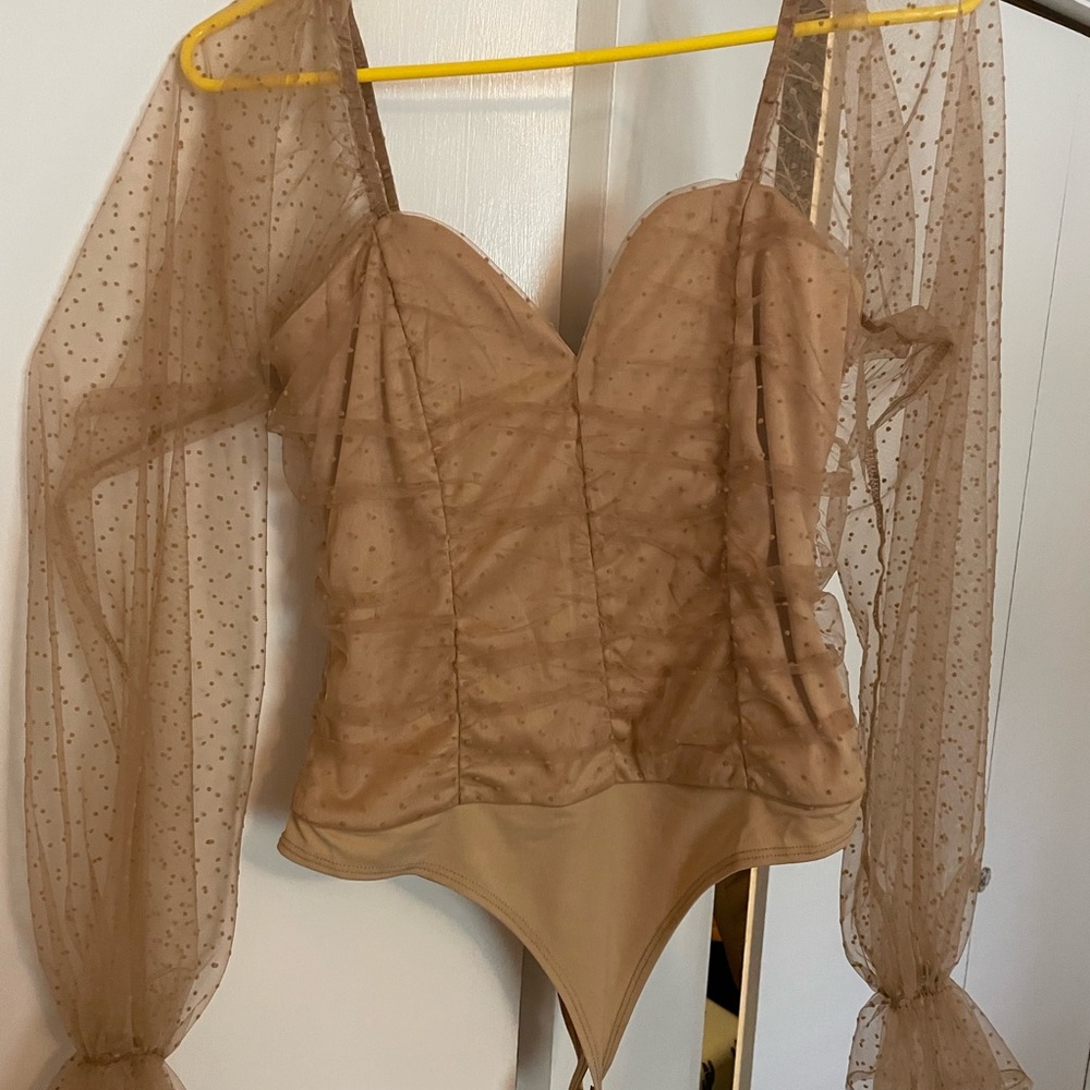 Tan body suit